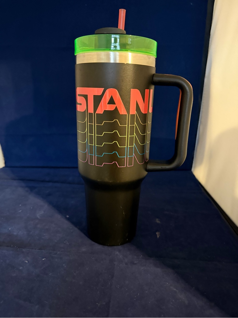 Stanley Black Travel Mug with Neon Green Lid and Red Accents
